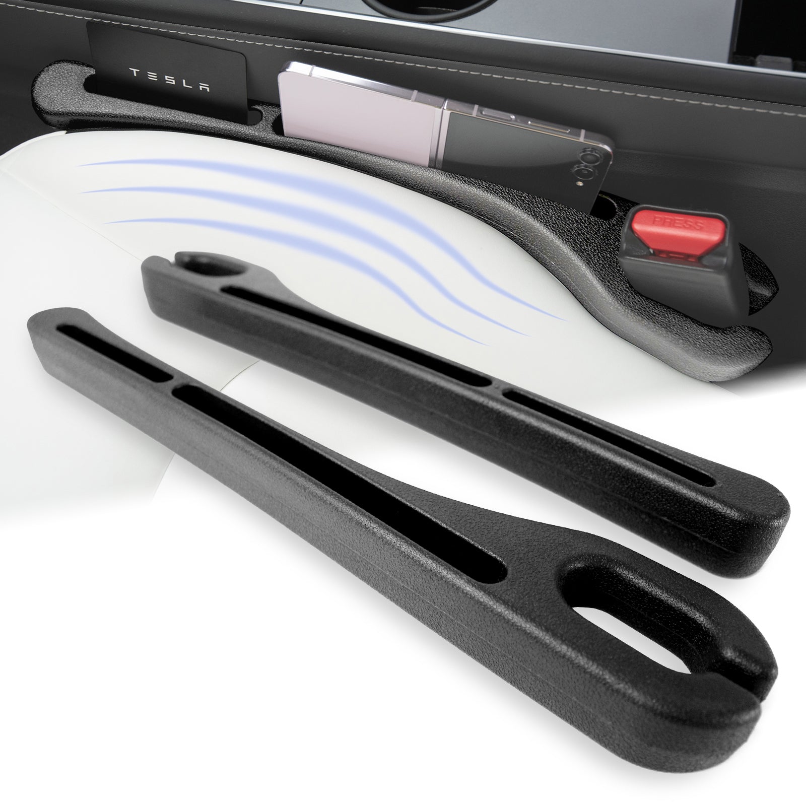 Black seat gap fillers made of plastic, designed to fit between vehicle seats, displayed alongside a car seat.